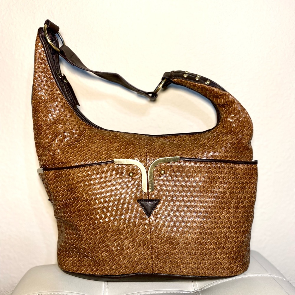 Covington Bohemian style purse with metal accents